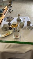 Teacups and saucers, vase, figurines