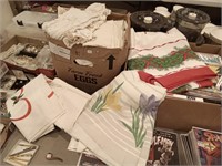 box full of linens,table cloths,dollies & more