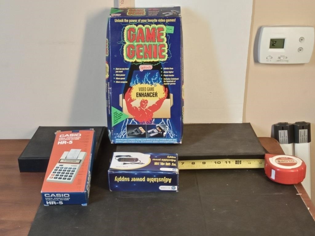 Nintendo Game Genie with box & more