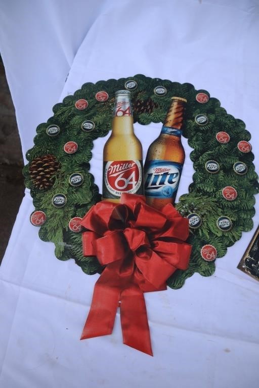 Miller wreath and Miller Brewing co signs