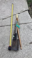 Walking stick, branch snippers, shovel