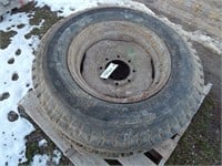 Pair of tires on rims; size: 8.25-20