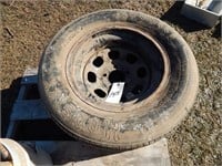 Pair of racing tires on rims; buyer confirm size