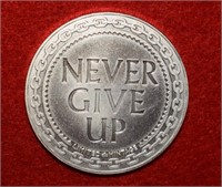 1oz .999 Silver Bar "Never Give Up" Round