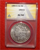 1884 Morgan Silver Dollar-Toned   AU50  ANACS