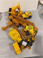 GROUP OF CONSTRUCTION TOY TRUCKS