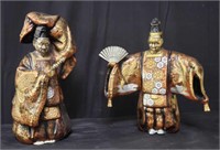 Pair of shelter Asian figures,