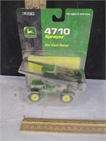 Ertl 1/64th JD 4710 Sprayer in package