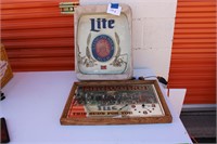 Miller Lite sign and Budweiser clock