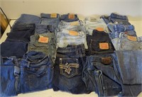 Large tub of 20 pairs designer denim jeans -