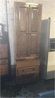Tall one piece storage cabinet ,3 drawers