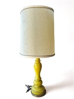 Mid century yellow glass table lamp 
32 1/4” h.