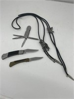 2 Bolo Ties (wolf & Eagle) And 3 Jack Knives