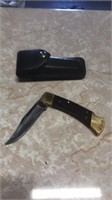 8.5 buck knife w leather case