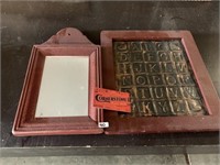 FRAMED MIRROR AND METAL SAMPLER