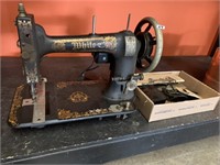 WHITE SEWING MACHINE WITH ACCESSORIES