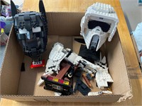 Box with LEGO head figures