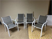 4 Stacking mesh lawn chairs