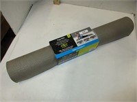 New yoga mat 68 inches long by 24 inches wide