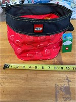 Brand new Lego bag with some Legos.