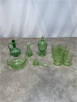 Green glass tumblers, cruet, vase and small jar
