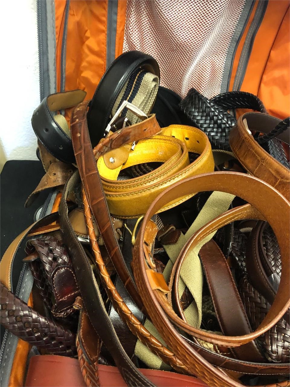 Suitcase full of belts #116