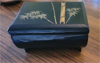 Diminutive black lacquer musical jewelry box