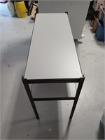 A metal to shelf table
32x18x45