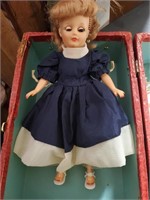 1950s doll with clothes in box
