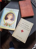 3 books,Shirley temple,Uncle Tom's Cabin, Red