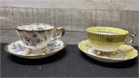 Pair Of Violet Pattern Footed Cups & Saucers Made