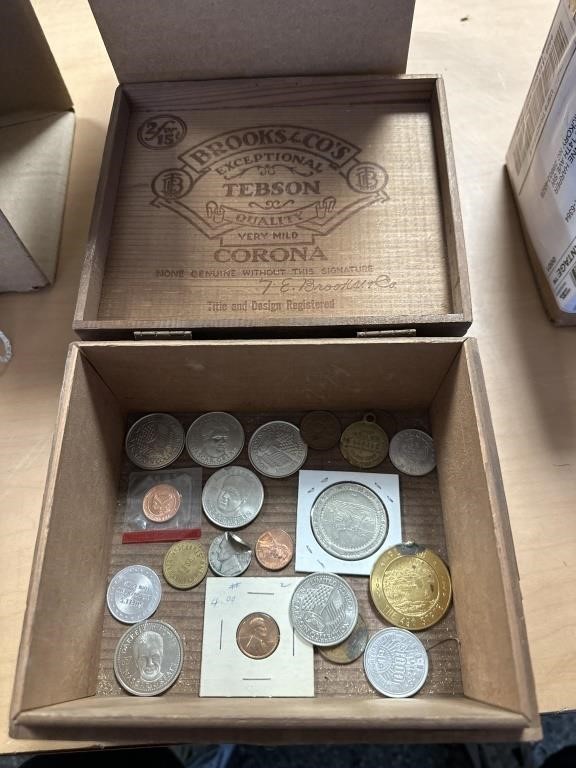 Wooden box with lot of mixed coins