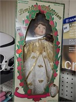 Genuine porcelain doll, includes matching ornament