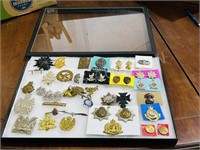 collection of varius military pins in display