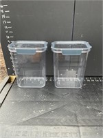 Two plastic food storage containers