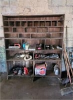 Shelf, brooms, shop vac, tools