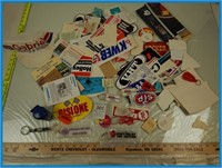 LARGE ASSORTMENT OF CAR STICKERS AND KEYCHAINS