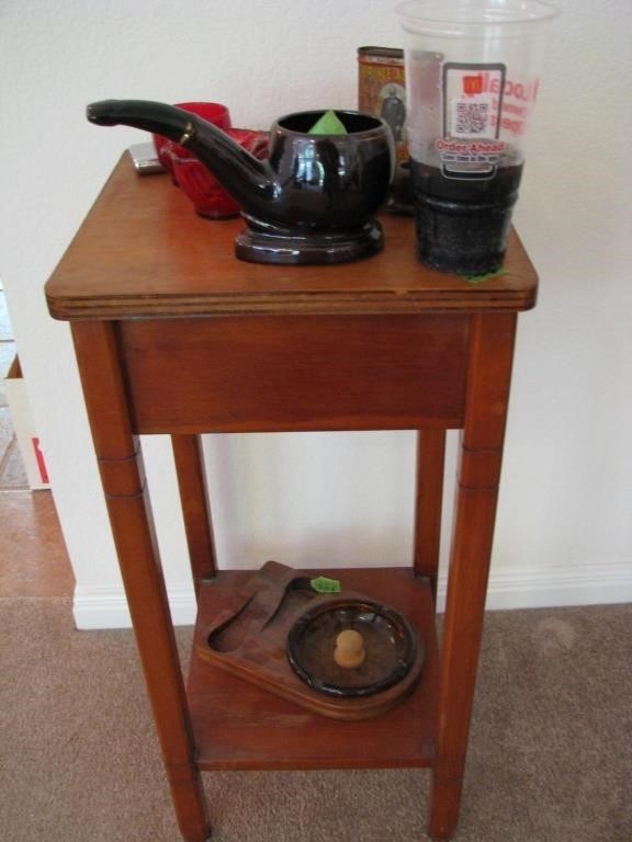 Wooden table with smoking items