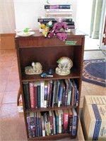 Bookshelf with misc contents