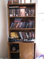 Bookcase with misc DVD's, misc items