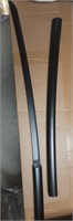 Black katana sword with smooth grip and wooden