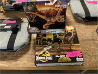 Jurassic park dinosaur figures and Dr. Alan figure