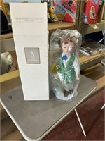 avon girl scout doll on stand in original box