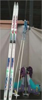 Pair Fischer Skis, Excel Poles, & Salomon Boots