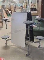 Folding cafeteria table. Seats 8 but missing one