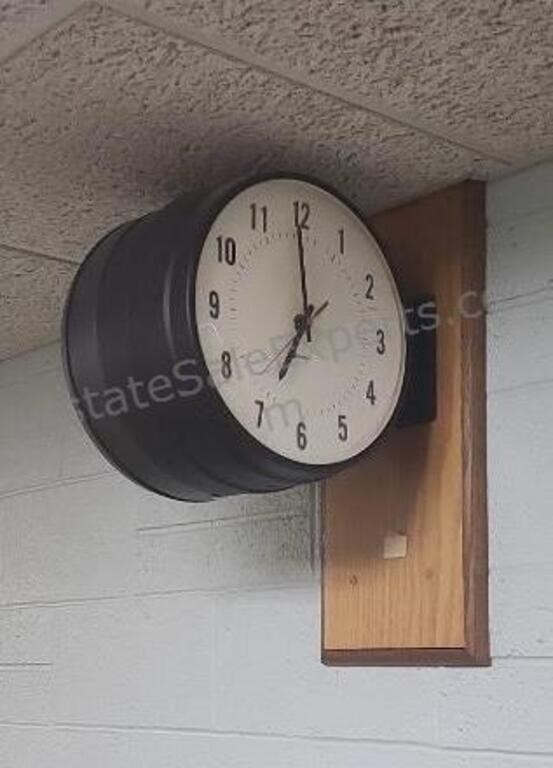 Two sided wall clock. Buyer must bring tools to