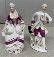 Pair of colonial figurines