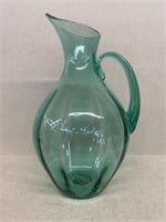Green blown glass pitcher