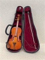 Miniature wooden violin