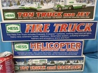 4 Hess Toy Trucks, years 2000,2001,2009,2010